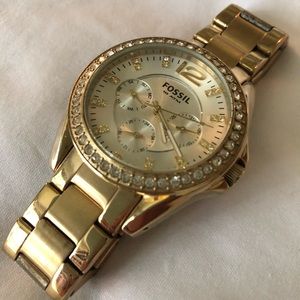 Gold large-faced Fossil watch